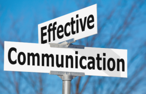 An illustrative photo featuring a cross street with a street sign. One street sign reads "Effective," while the other sign reads "Communication." The sign is symbolizing the concept explored in the blog post titled "Why Saying 'No' to Your Puppy Doesn't Work." The image implies the potential pitfalls of relying on the command "no" as a training tool and suggests alternative approaches that prioritize effective communication for successful puppy training. Puppy owners should understand the limitations of using "no" and emphasizes the importance of fostering positive communication with their puppies.